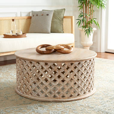 Round lattice carved wood deals coffee table